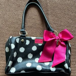 Betsy Johnson shoulder bag with large pink bow.